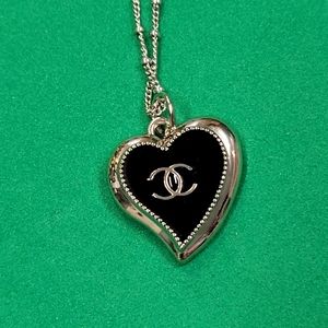 UPCYCLED CHANEL HEART CHARM ZIPPER PULL ON A KNOTTED SILVER PLATE CHAIN